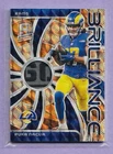 2024 Spectra Neon Orange Prizm Laundry Tag Relic Puka Nacua Rams 8/10