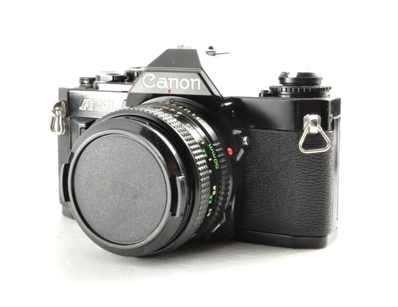CÁMARA SLR Canon AV-1 av-1 negra con lente NFD 50 mm 1:2 35 mm casi como nueva probada Foto 2 de 4
