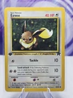 POKEMON EEVEE 55/82 1ST EDITION TEAM ROCKET LP