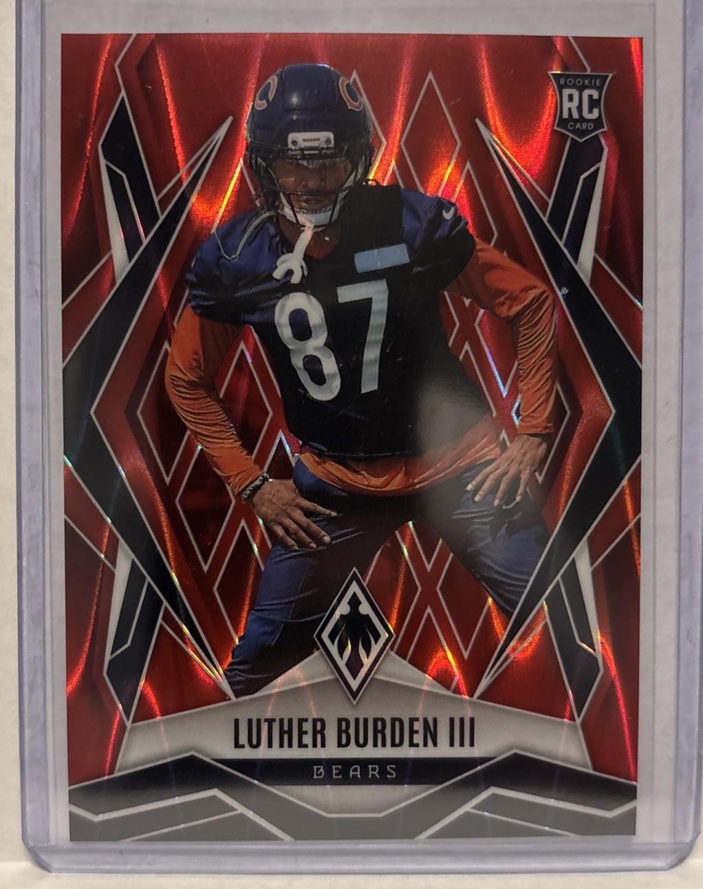 2025 Panini Phoenix Luther Burden RC Red Seismic/99 Chicago Bears #196