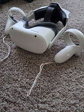 Meta Quest 2 128gb with controllers, and batt...