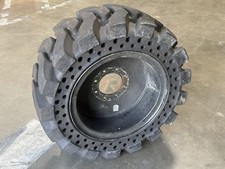 14-17.5 Set Of 2 Solid Skid Steer Tires With Rims 17x16.5 - Used