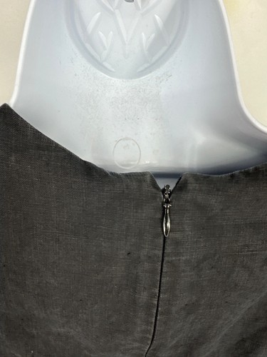 Black linen short sleeve shift dress size 6 with front zipper closure, displayed on white mannequin torso.