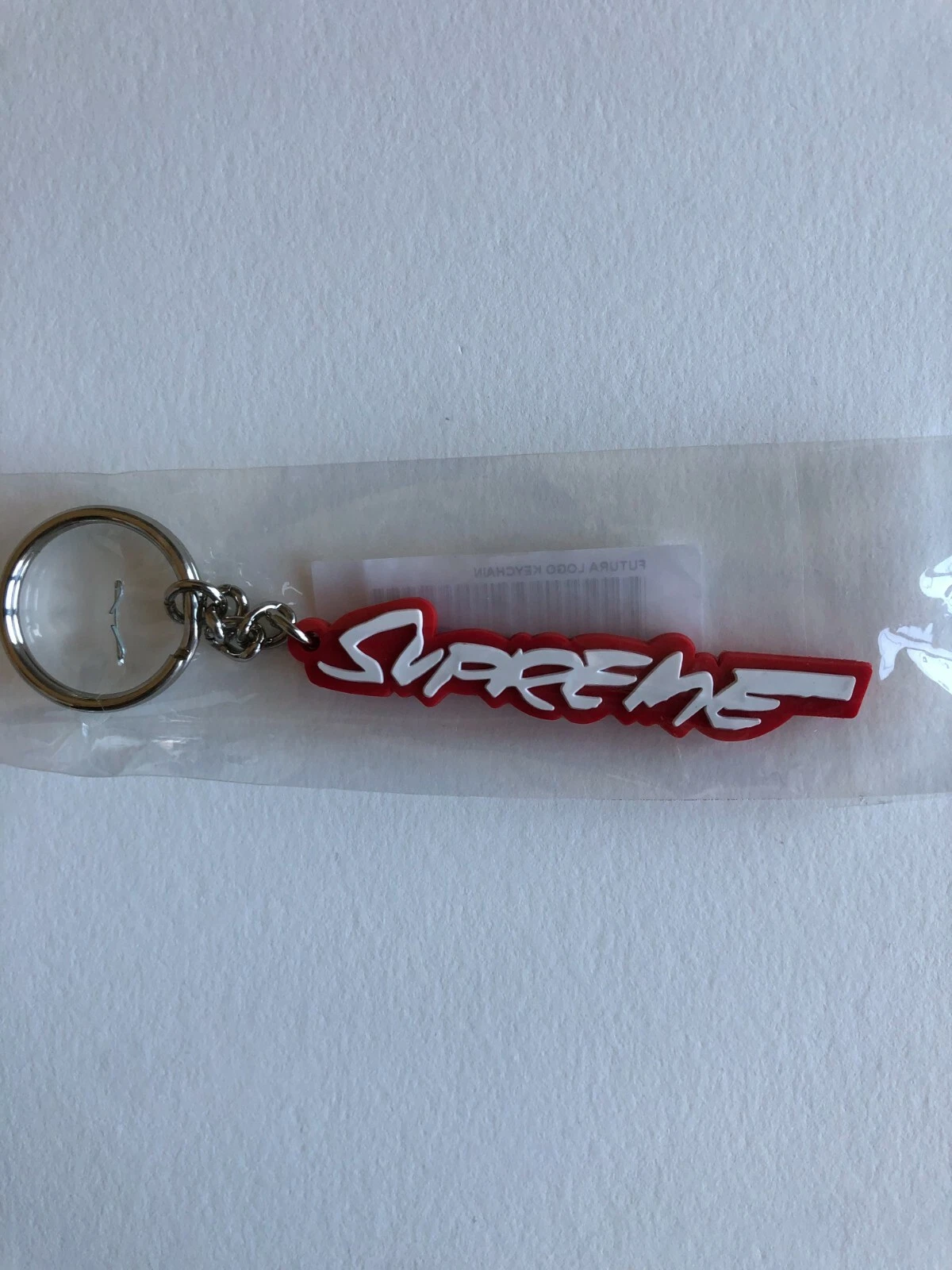 Porte clés Supreme Futura Logo Neuf FW20