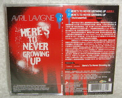 Avril Lavigne - Here's To Never Growing Up (Lyrics) 