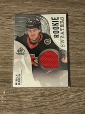 2023-24 UD SP Game Used Rookie Sweaters Ridly Greig Rookie Relic RC