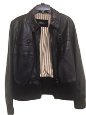 Leather Jacket Oakwood-women-used. Black . About 25”x18” See Pictures