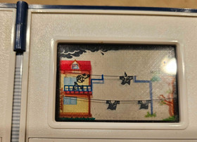 NINTENDO RAIN SHOWER Game and Watch vintage electronic handheld LCD game 1983