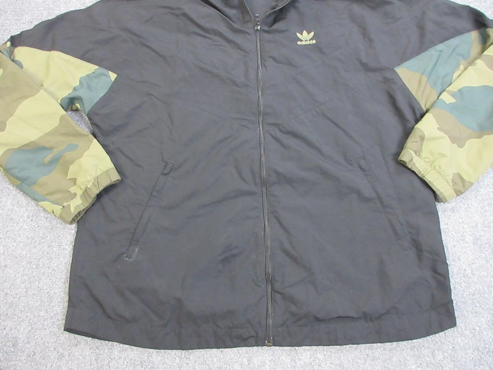 Chaqueta Adidas Para Hombre Grande Negra Camuflada Con Capucha Cremallera Completa Trifolio Cortavientos FM3359 Foto 2 de 4