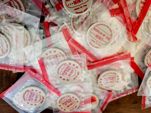 10 - Uncirculated US Bureau of the Mint Issued Plastic Tokens in Red Cellophane - Picture 3 of 3