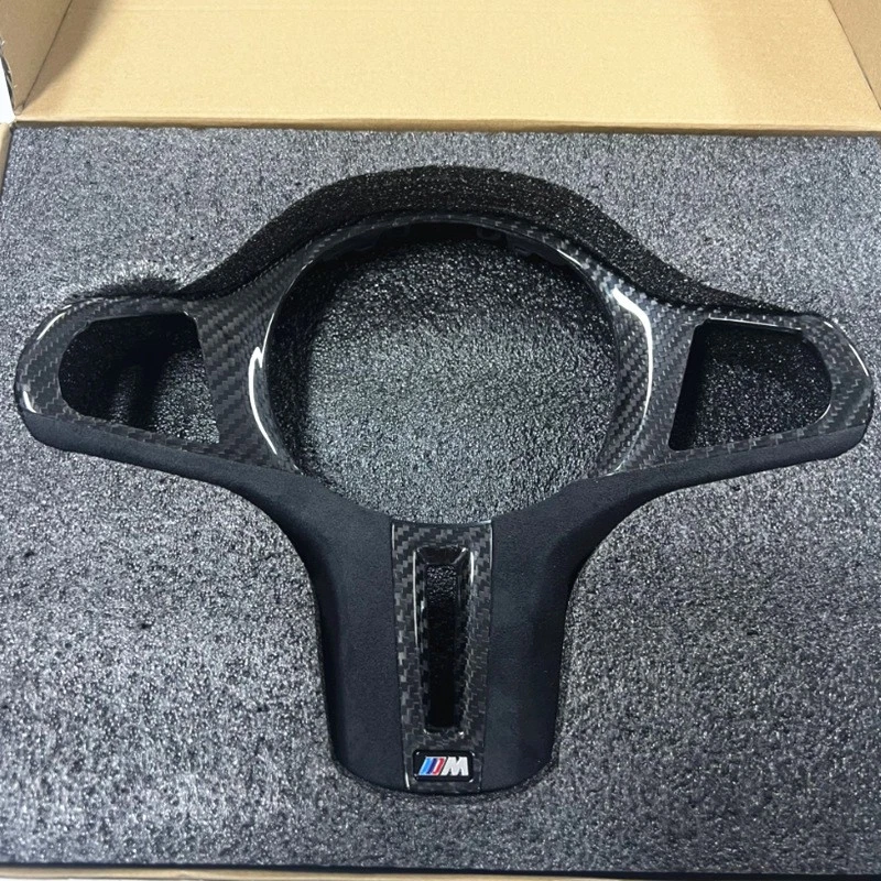 Tapicería de volante Alcantara de fibra de carbono para BMW X5 M50i M60i G05 2019-2026 Foto 2 de 2