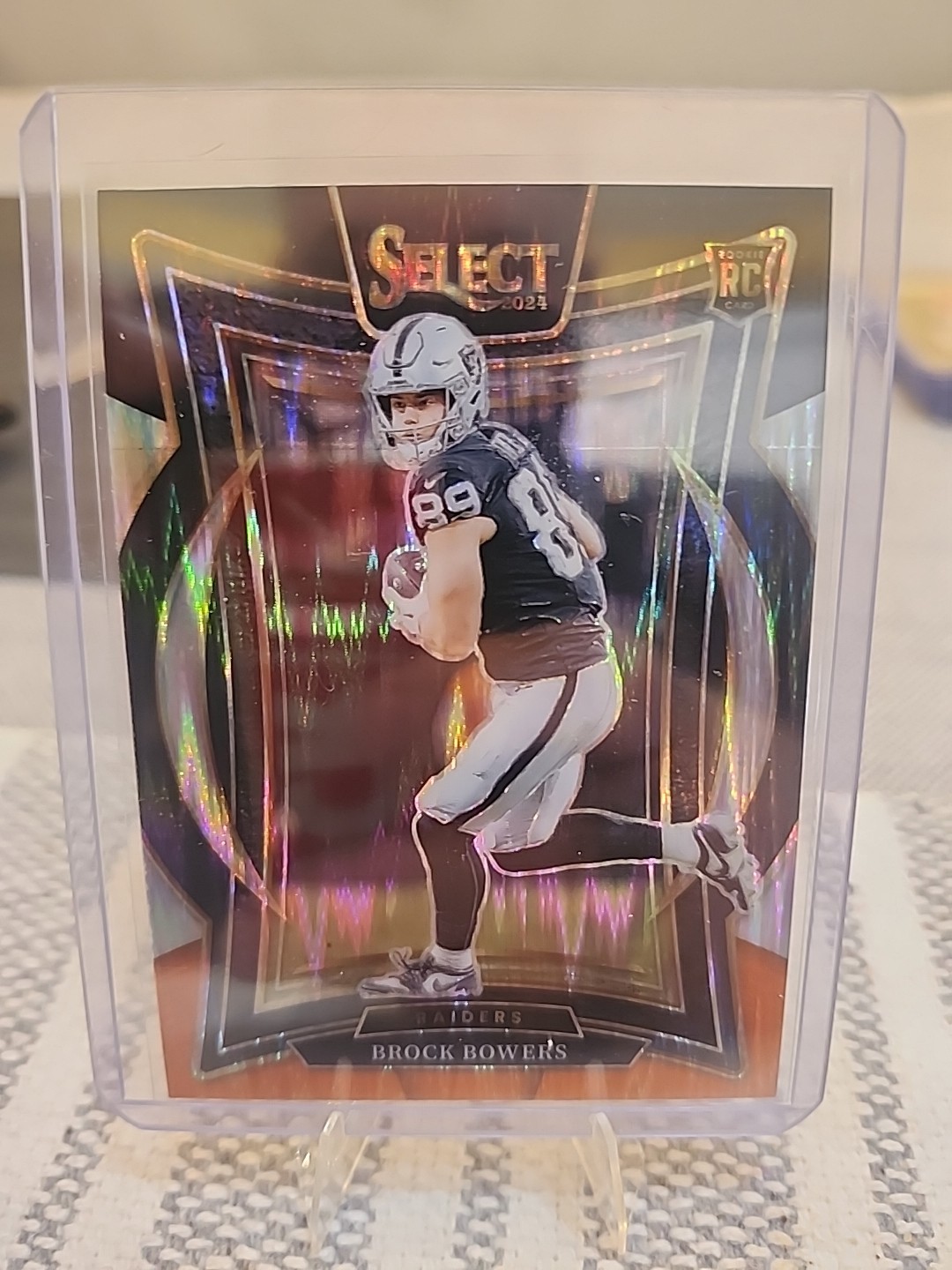 2024 Panini Select - Concourse Brock Bowers #31 Black & Orange Shock Prizm (RC)
