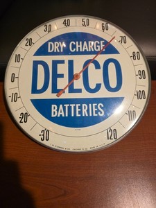 1950s DELCO 12" DRY CHARGE BATTERIES ADVERTISING WALL THERMOMETER 12"