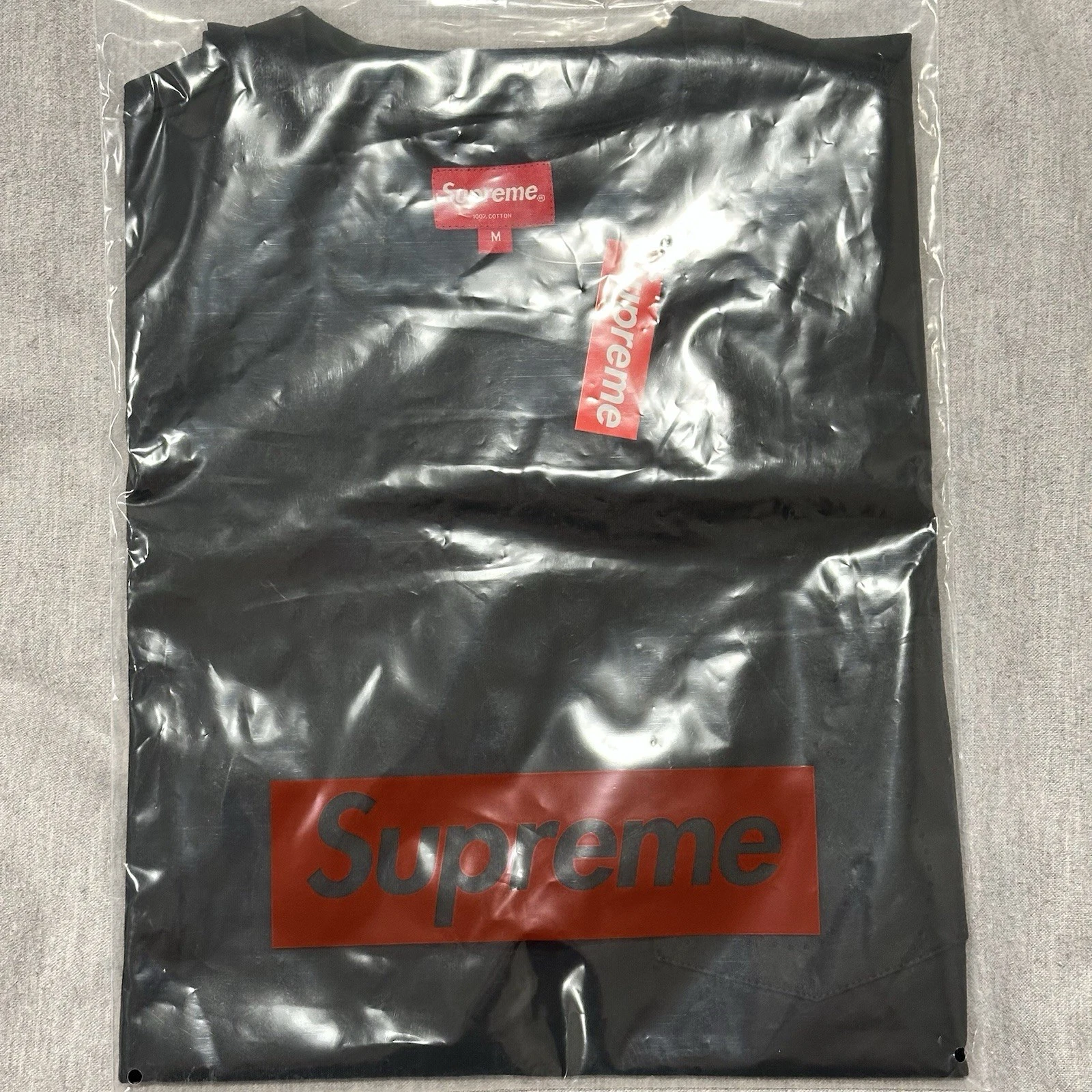 Tee shirt noir Supreme Laser Cut logo poche taille moyenne M homme SS21