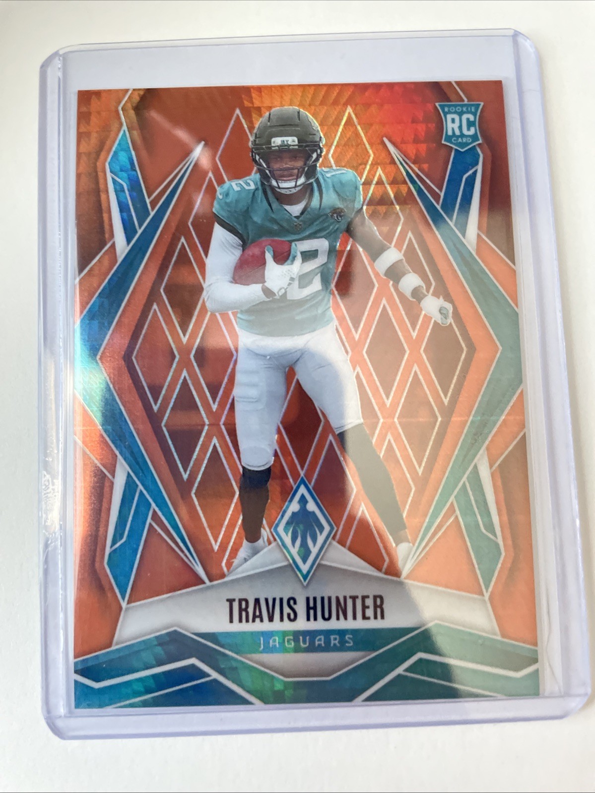 2025 Panini Phoenix - Rookies Travis Hunter #157 Red /99 (RC) Print Line