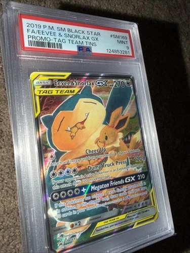 2019 P.M. SM Black Star FA/EEVEE & Snorlax GXPROMO-TAG Team Tins PSA 9