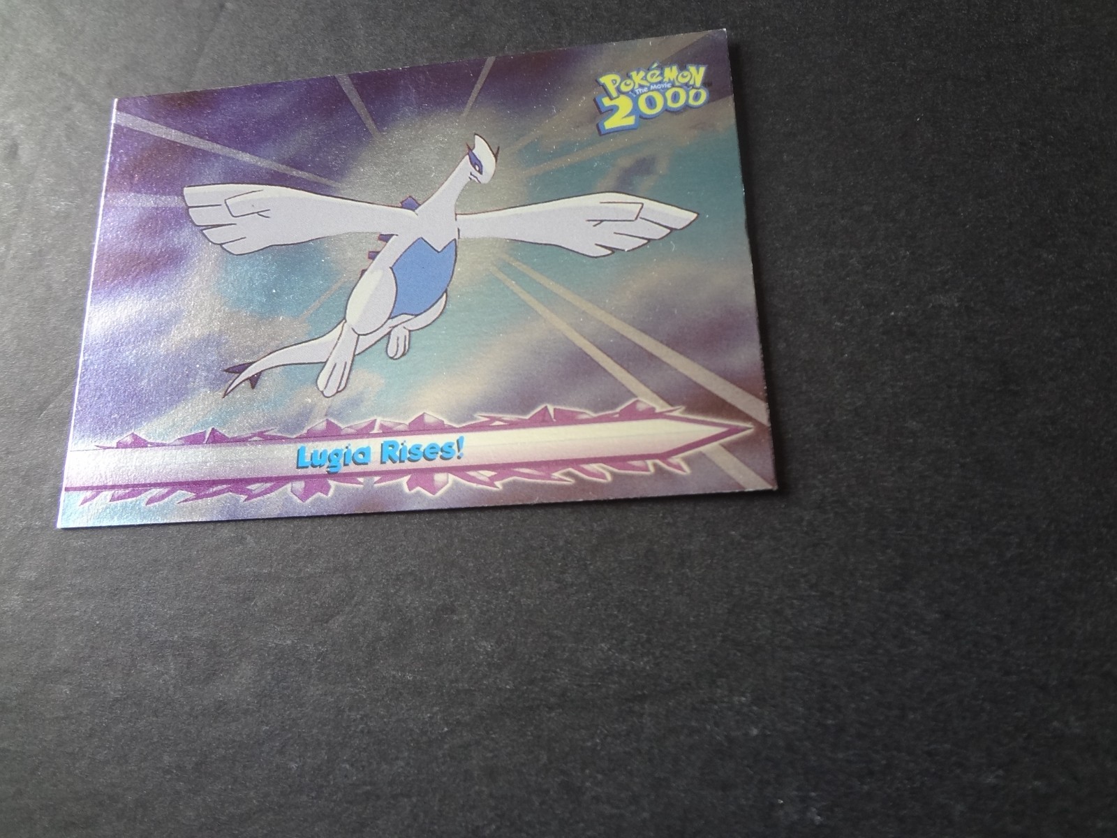 Topps Pokemon Movie 2000 Silver Foil #64 Lugia Rises Blue Logo 1st