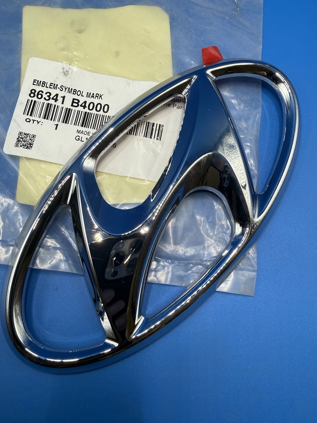 Logo avant HYUNDAI i20 terni ? Solution de rechange d'origine 86341-B4000 pour calandre