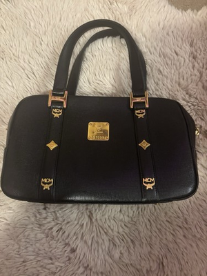 #ad mcm handbag authentic used $150.00