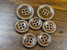 Buttons 7 light brown leather look with stitching around edge 4-hole flat 13/16-