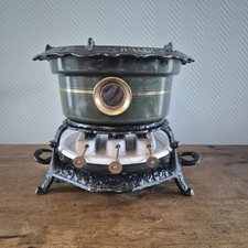 Ancien poêle à pétrole GEORG HALLER en fonte émaillée brûleur émaillé