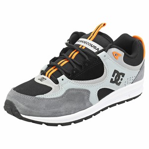 black and orange dc shoes