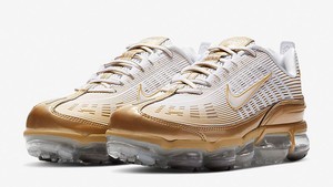 gold and white vapormax