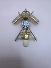 WW2 The 27th Lancers cap badge.