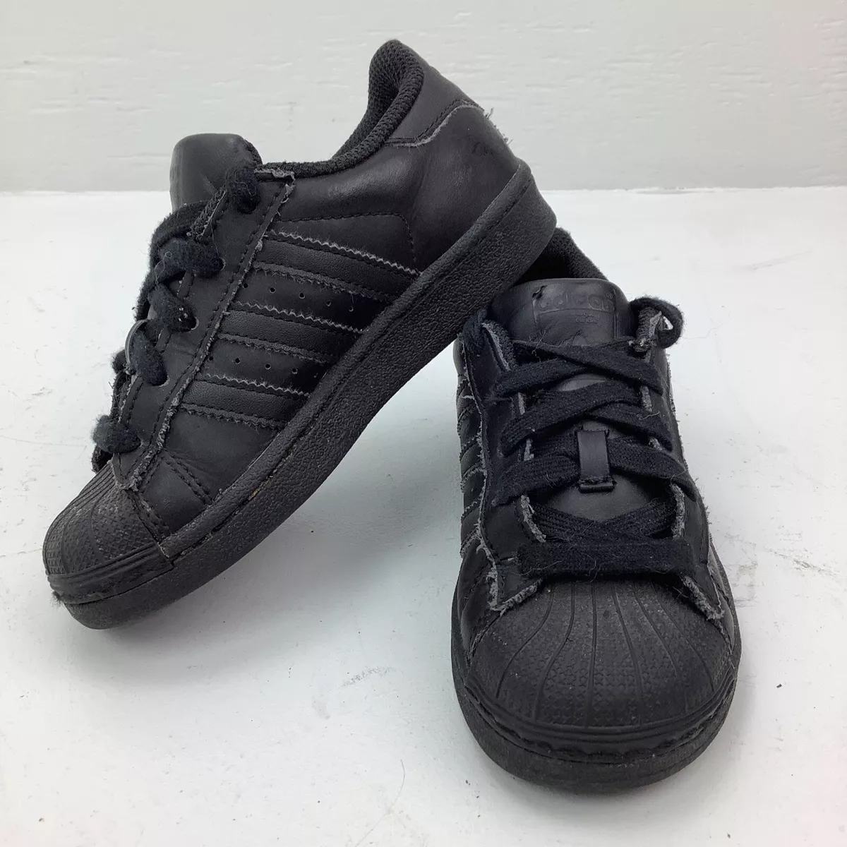 Adidas superstar suede zwarte lage sneakers 2025
