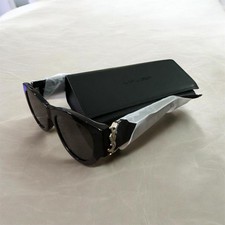 Saint Laurent SL M94 sunglasses in shiny black with a prominent silver Logo