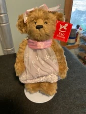 F.A.O. Schwarz tan Bear in her pink & white sleeping outfit she is 12” tall