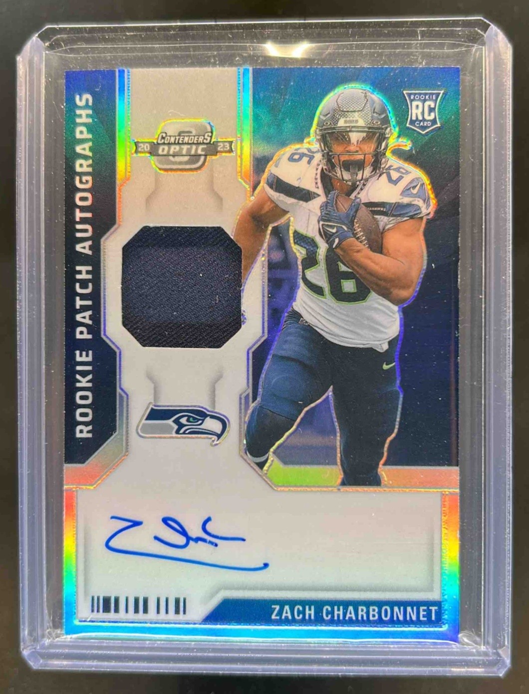 2023 Contenders Optic Zach Charbonnet Rookie Patch Auto RC #15/75 Seahawks
