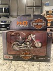 Maisto 1999 Harley-Davidson FLSTF-Fat Boy Red/Silver 1/8 scale diecast  — photo 1