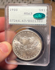 (#102396) Morgan Dollar: 1900 PCGS MS 63 CAC.  rattler.  OGH.   (see video!) — photo 2