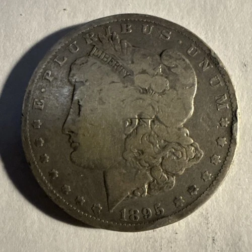 1893-O Morgan $1 – VG Cond – Rim Bump Scratched Tough Date