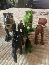 Lot of 2 Robo Alive T-Rex Green & Gray. 4 Soft Rubber Stegosaurus T-Rex Dinos.