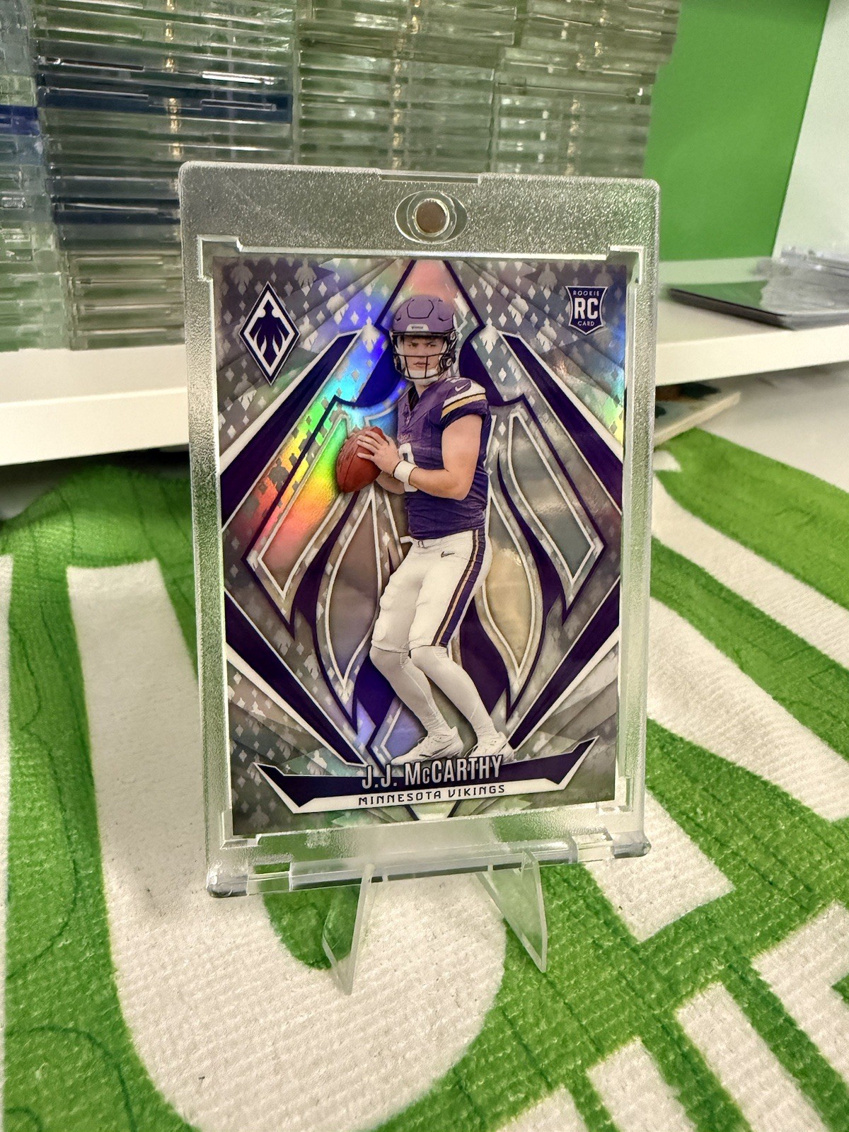 2024 Panini Phoenix - Rookies J.J. McCarthy #185 Phoenix Logo /299 (RC)