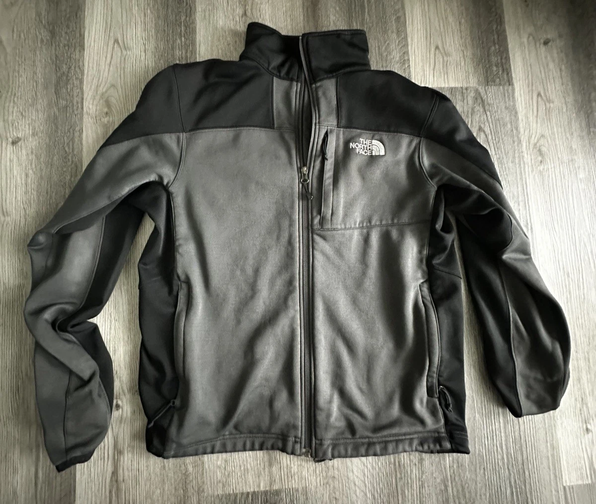The North Face Men's Apex Bionic jacket in a black and gray colorway. Size M
