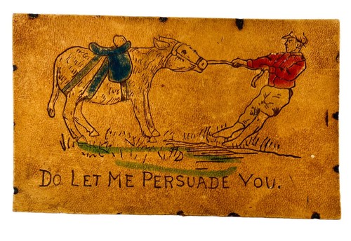 Cartolina antica in PELLE LASCIA CHE TI CONVINCA uomo che tira asino testardo