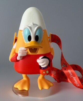 Sealed Disney Glow in The Dark Donald Duck Candy Corn Sipper Lanyard Halloween
