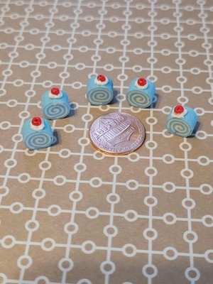Dollhouse Miniature Blue Cake Roll Slices with Whipped Cream and Cherry Topping