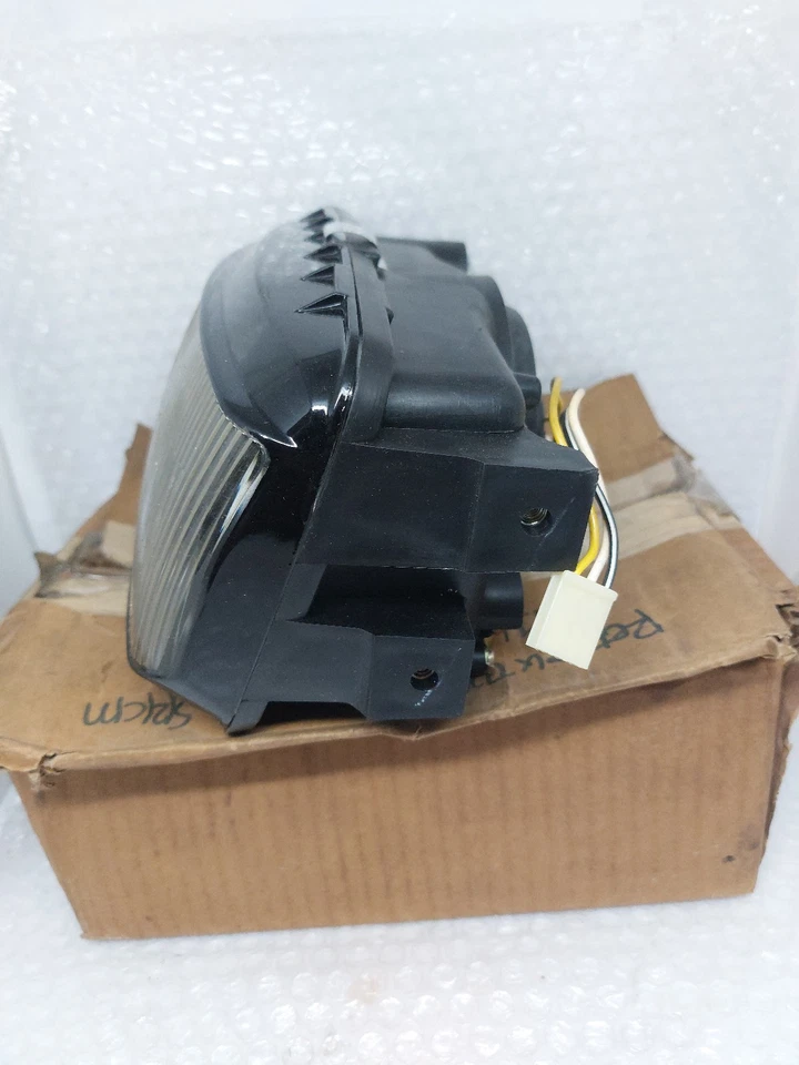 Conjunto de faros delanteros originales Suzuki RG150R RGR150 NUEVO DE STOCK Foto 4 de 4