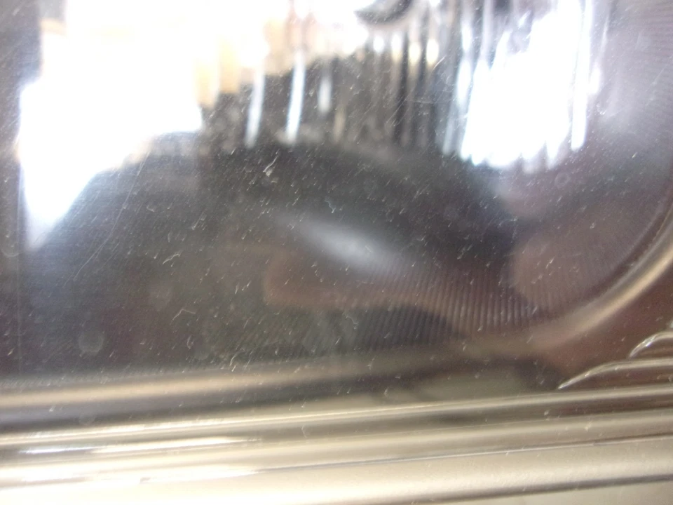 Faro compuesto halógeno LH Chevrolet Express/Savana Driver 2003-2023 OEM Foto 4 de 4