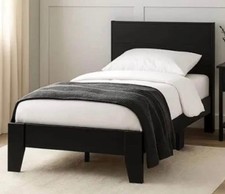 Brand new black single wooden bed frame with mattress.