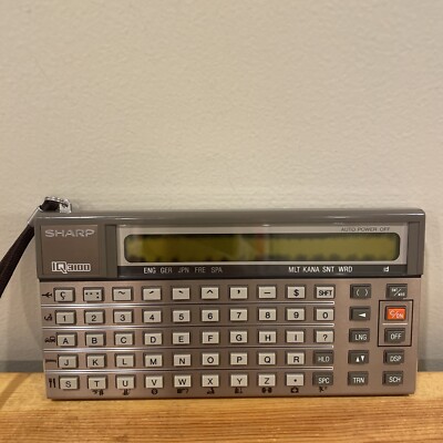 Rare Sharp IQ-3100 Language Translator W/ German, Spanish,French Modules Works