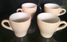 Four Espresso Demitasse Cups in White Made of Stoneware Retro style