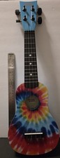 First Act Discovery ukulele with a tie-dye design 4 String