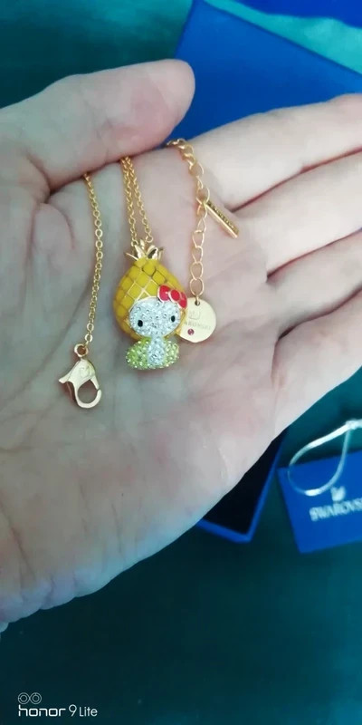 Collier Swarovski Hello Kitty pendentif ananas jaune en cristal et métal rhodié
