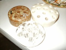 three flower frogs  one glass two pottry