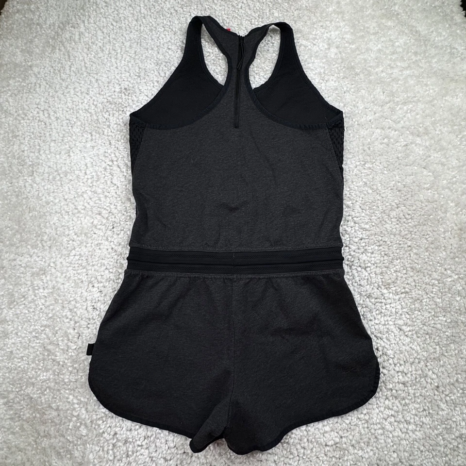 Mameluco de malla Nike Court negro para mujer pequeño Foto 2 de 4